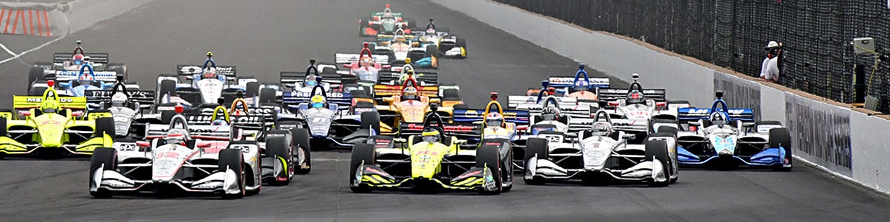 indy cars racing to through the start line Tulsa