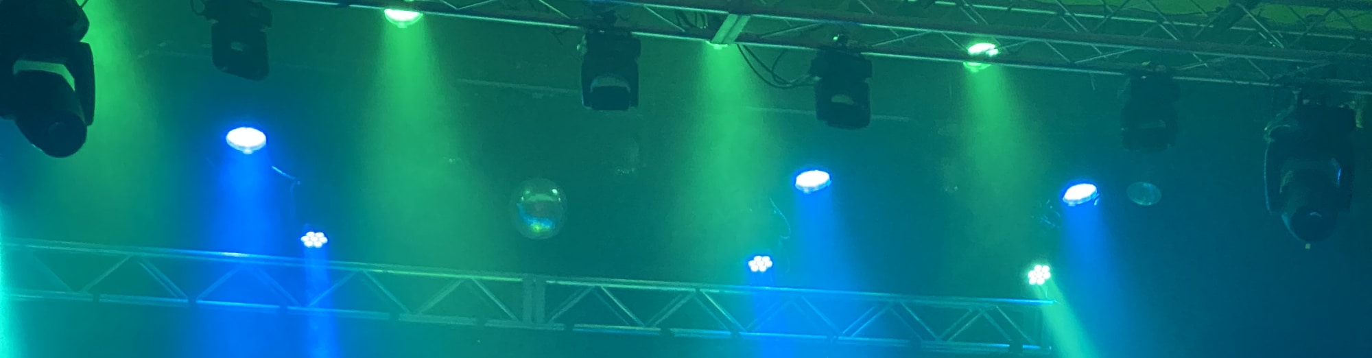 blue and green theater stage lights Tulsa