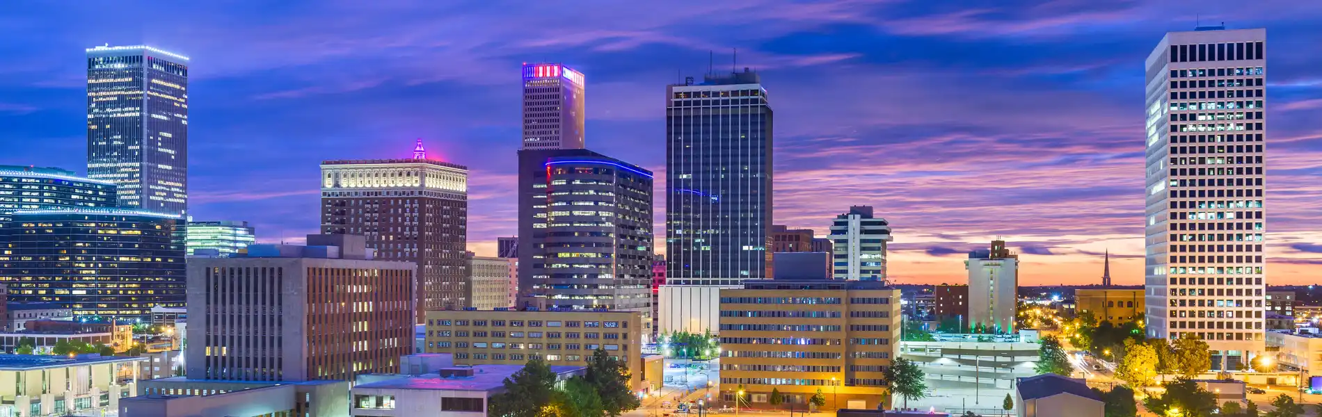 Neon color image of a band playing and people singing along